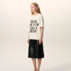 T-shirt bianca in cotone con stampa distintiva T-shirt bianca in cotone con stampa distintiva