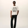 T-shirt bianca in cotone con stampa distintiva T-shirt bianca in cotone con stampa distintiva