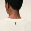 T-shirt bianca in cotone con stampa distintiva T-shirt bianca in cotone con stampa distintiva