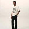 T-shirt bianca in cotone con stampa distintiva T-shirt bianca in cotone con stampa distintiva