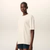 T-Shirt in cotone bianco Ami de Coeur con stampa in rilievo T-Shirt in cotone bianco Ami de Coeur con stampa in rilievo