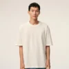 T-Shirt in cotone bianco Ami de Coeur con stampa in rilievo T-Shirt in cotone bianco Ami de Coeur con stampa in rilievo