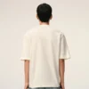 T-Shirt in cotone bianco Ami de Coeur con stampa in rilievo T-Shirt in cotone bianco Ami de Coeur con stampa in rilievo