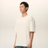 T-Shirt in cotone bianco Ami de Coeur con stampa in rilievo T-Shirt in cotone bianco Ami de Coeur con stampa in rilievo