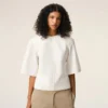 Top aderente a maniche corte in cotone bianco Top aderente a maniche corte in cotone bianco
