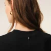 Top aderente senza maniche in jersey nero Top aderente senza maniche in jersey nero