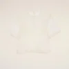 Top bianco in seta a maniche corte trasparente con sottotop Top bianco in seta a maniche corte trasparente con sottotop