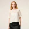 Top bianco in seta a maniche corte trasparente con sottotop Top bianco in seta a maniche corte trasparente con sottotop