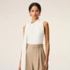 Top bianco senza maniche in jersey con scollo lavallière Top bianco senza maniche in jersey con scollo lavallière