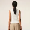 Top bianco senza maniche in jersey con scollo lavallière Top bianco senza maniche in jersey con scollo lavallière