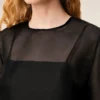 Top nero in seta a maniche corte trasparente con sottotop Top nero in seta a maniche corte trasparente con sottotop