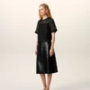 Top nero in seta a maniche corte trasparente con sottotop Top nero in seta a maniche corte trasparente con sottotop